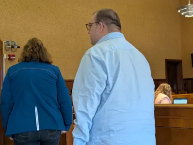 Walsh attends court hearing, charged with accosting for immoral purposes